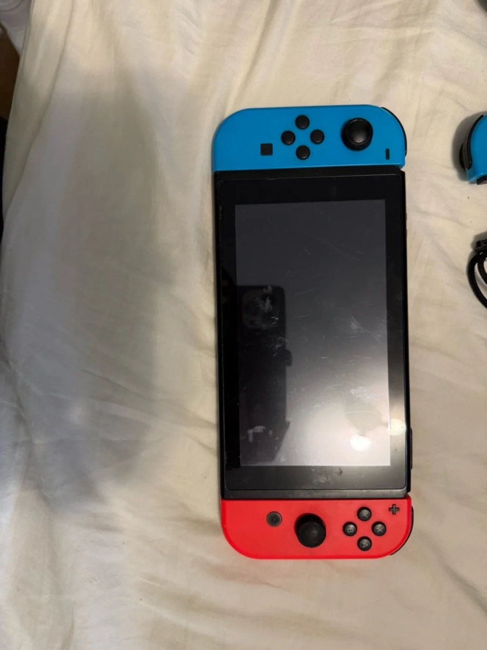 Nintendo Switch Console with Neon Joy-Cons + Accessories - Red/Blue/Yellow